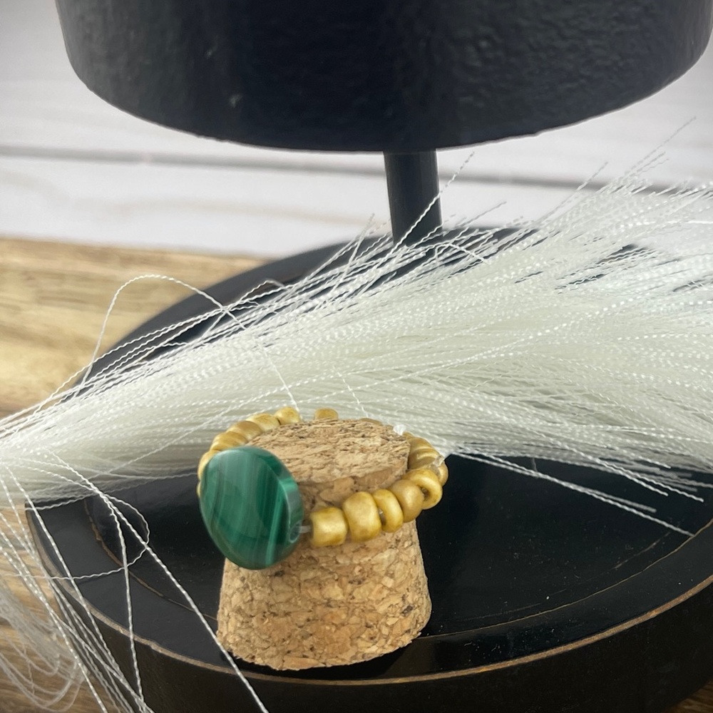 Green and brown stretch ring